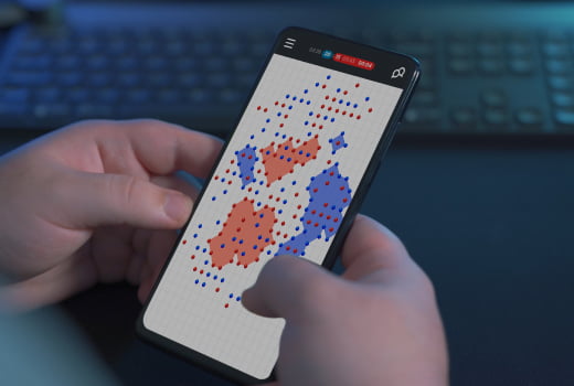 A person playing a mobile game