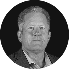 Black-and-white headshot of Bradley Wilson