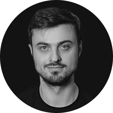 Black-and-white headshot of Alex Dulub