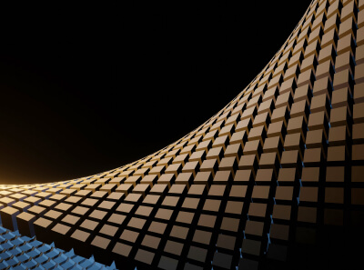 A pattern of golden cubes on a black background