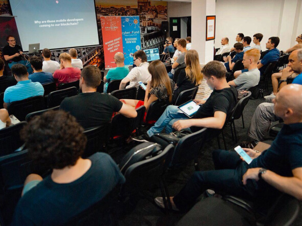 A PixelPlex speaker takes place in the blockchain-related event