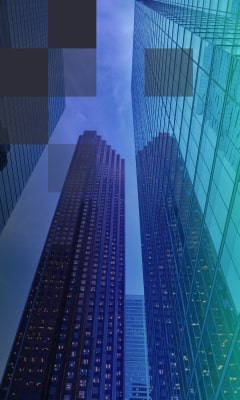  A view of a glass wall skyscrapers