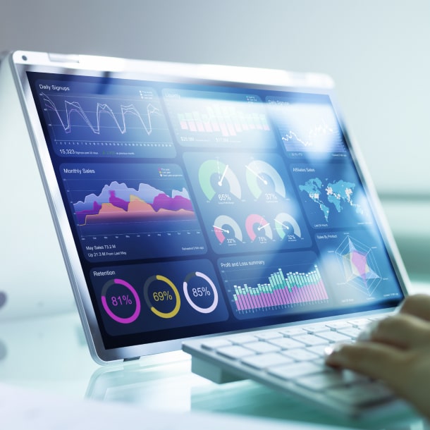 A person examining data visualization report on a tablet
