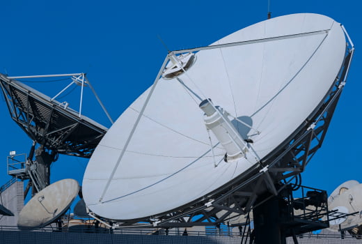 A satellite farm on a sky background