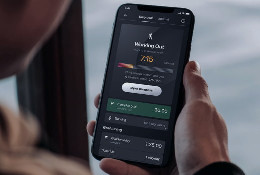 A person examining workout statistics on a phone
