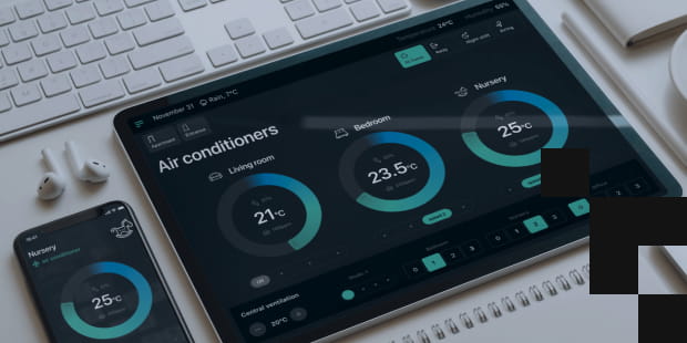 Several Apple devices on a white table