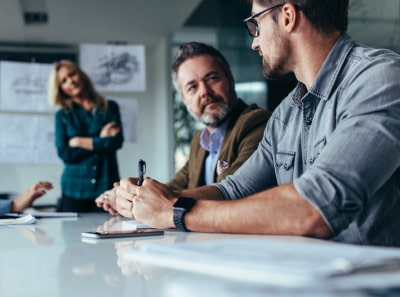 A team discussing technologies in real estate