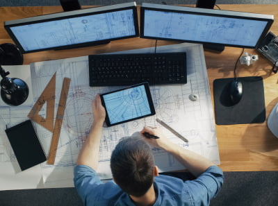 A person preparing an architecture draft