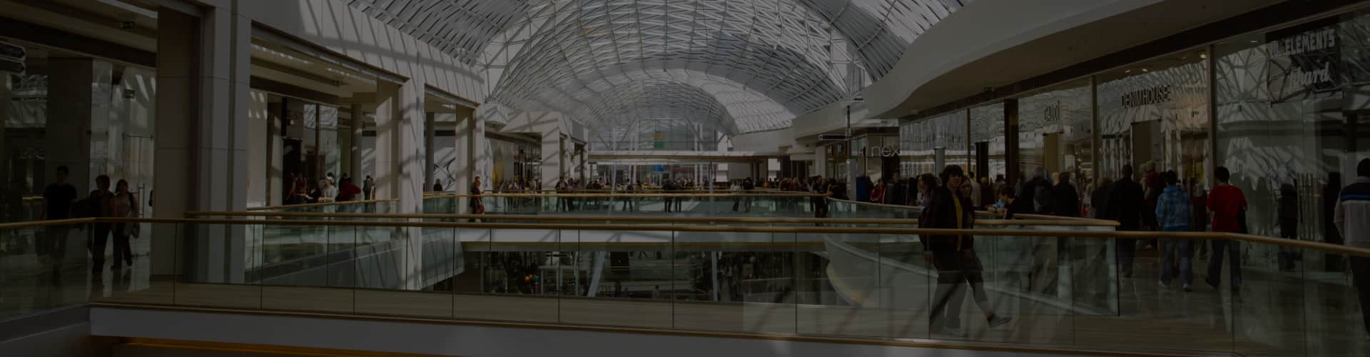 People go shopping on the top floor of a mall