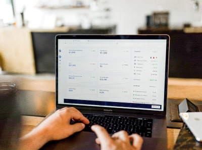 An experienced business analyst prepares research on the needs of a customer